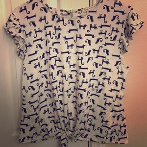 A dog and cat tie up shirt